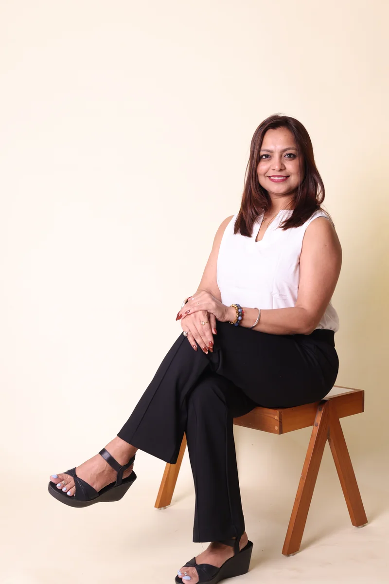 Shreya Joshi sitting on bench